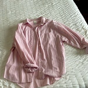 Light pink button down shirt with white stripes size small.